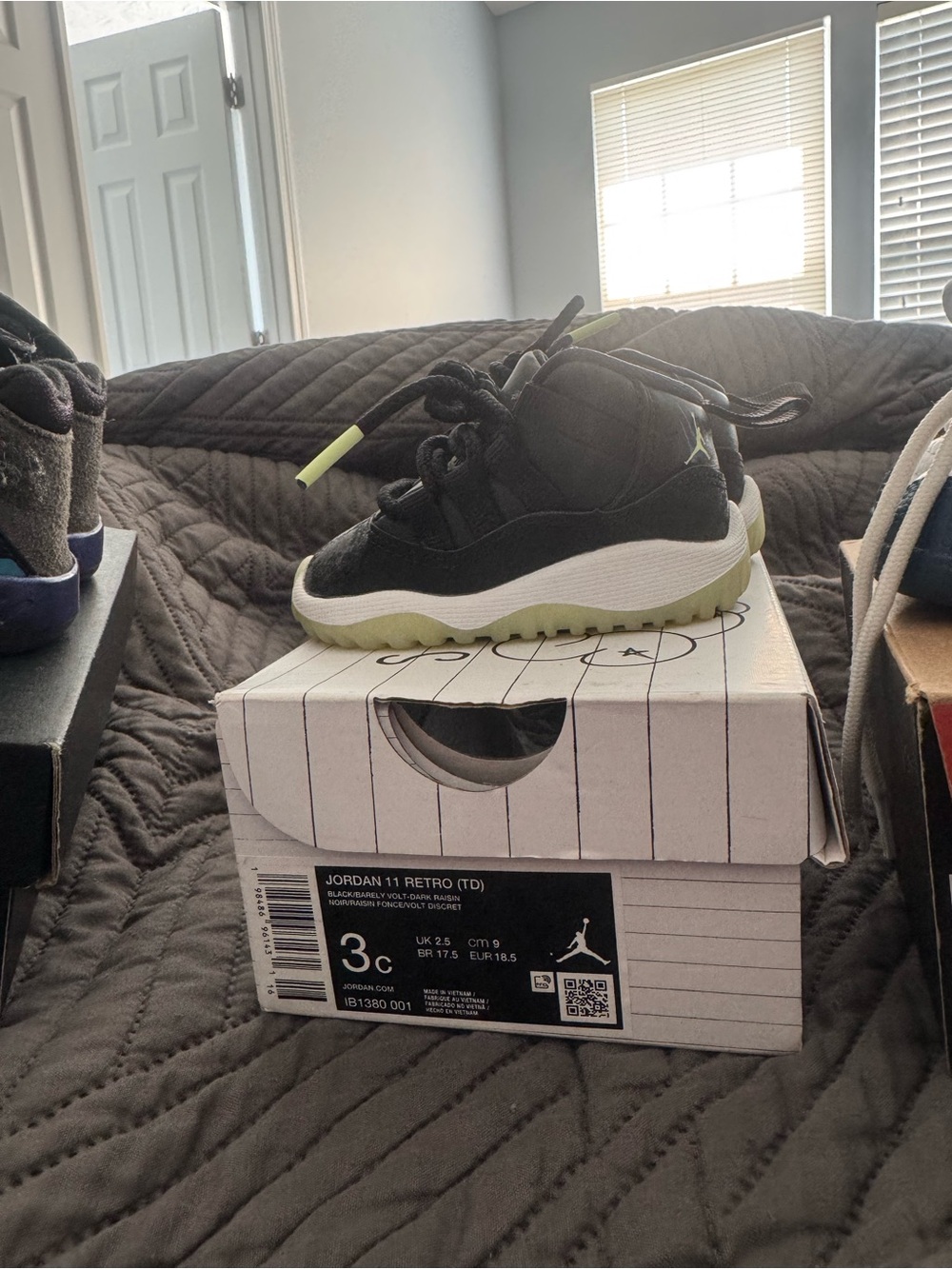 Jordan Kids Black and Lime Green Retro 11 Low Sneakers